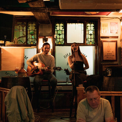 Musical duo performing live at Mulligans