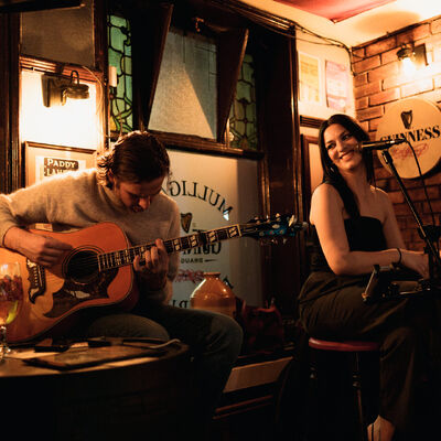 Musical duo performing at Mulligans venue