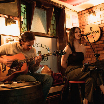 Live performance by duo at Mulligans