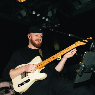 Guitarist performing on stage
